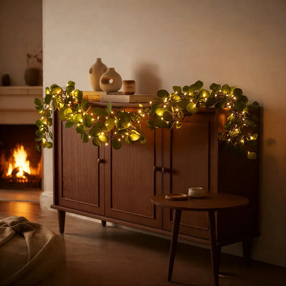 Dekoracyjna girlanda świetlna z zielonymi akcentami